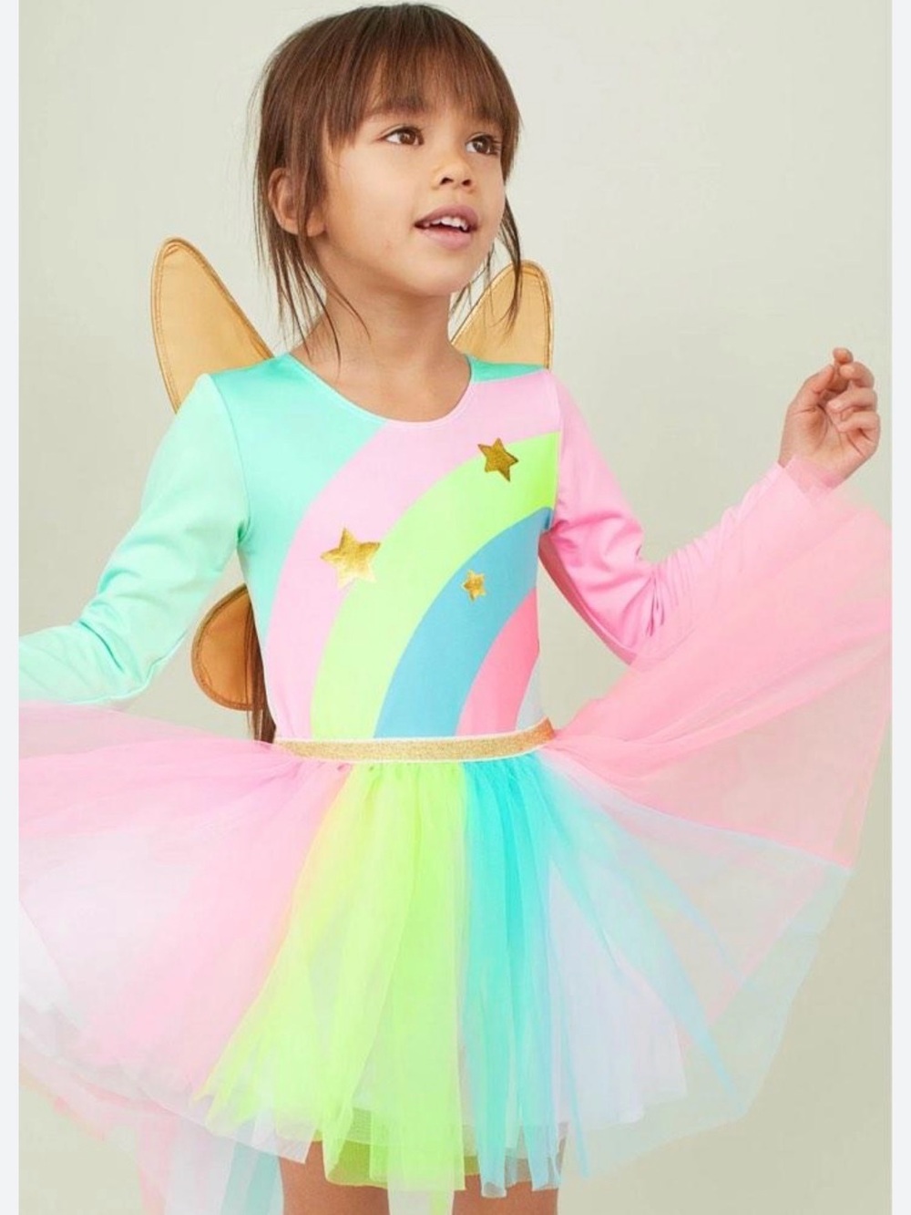 Colorful fairy dress with wings and tulle skirt